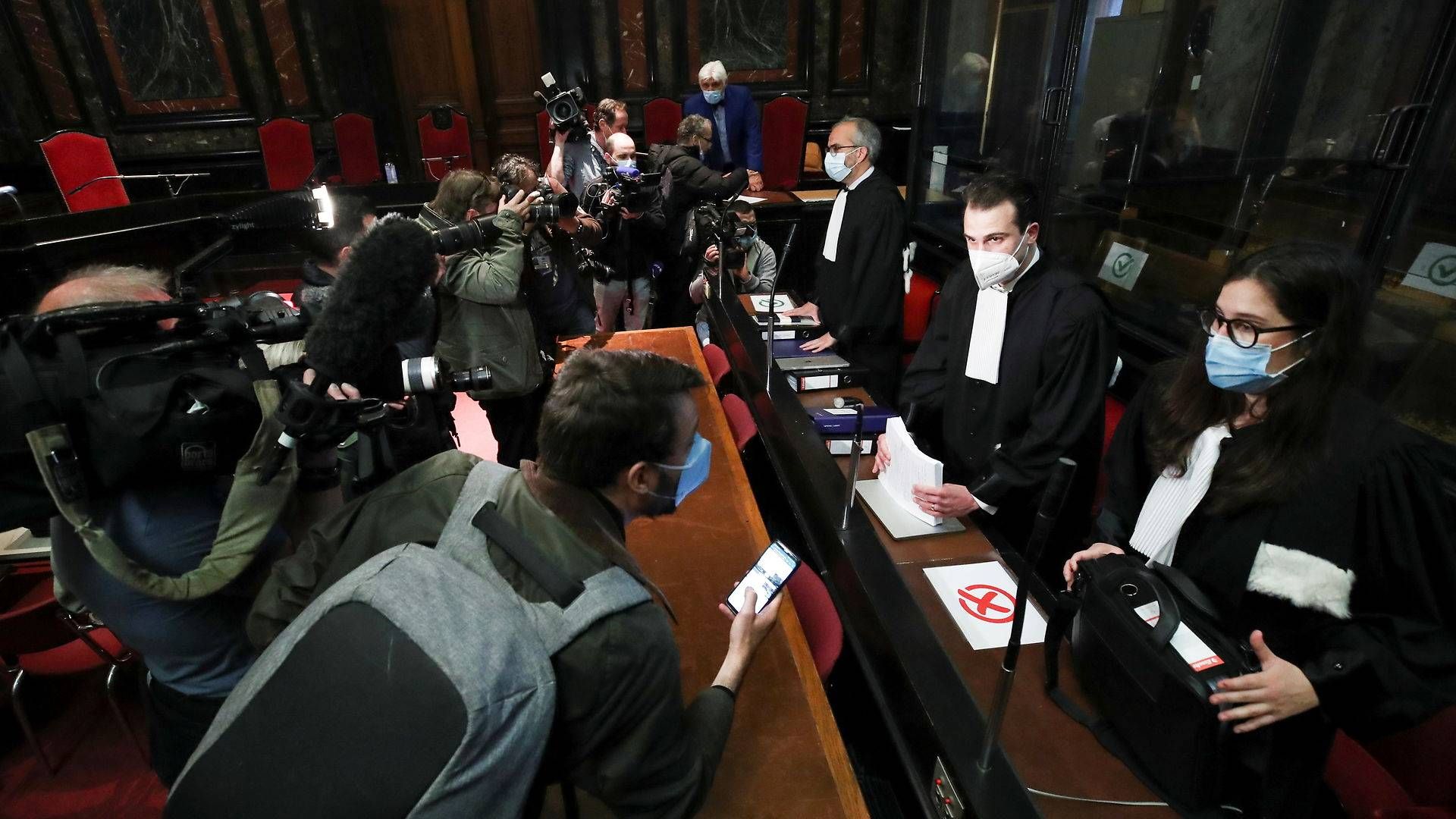 Lawyers for Astrazeneca Clemence Van Muylder, Hakim Boularbah and Stephanie De Smedt, arrive to attend a hearing at a Belgian court in the legal case against the British-Swedish firm accused by the EU of having breached its contract for the supply of the coronavirus disease (COVID-19) vaccines, in Brussels, Belgium May 26, 2021. | Photo: Yves Herman/Reuters/Ritzau Scanpix