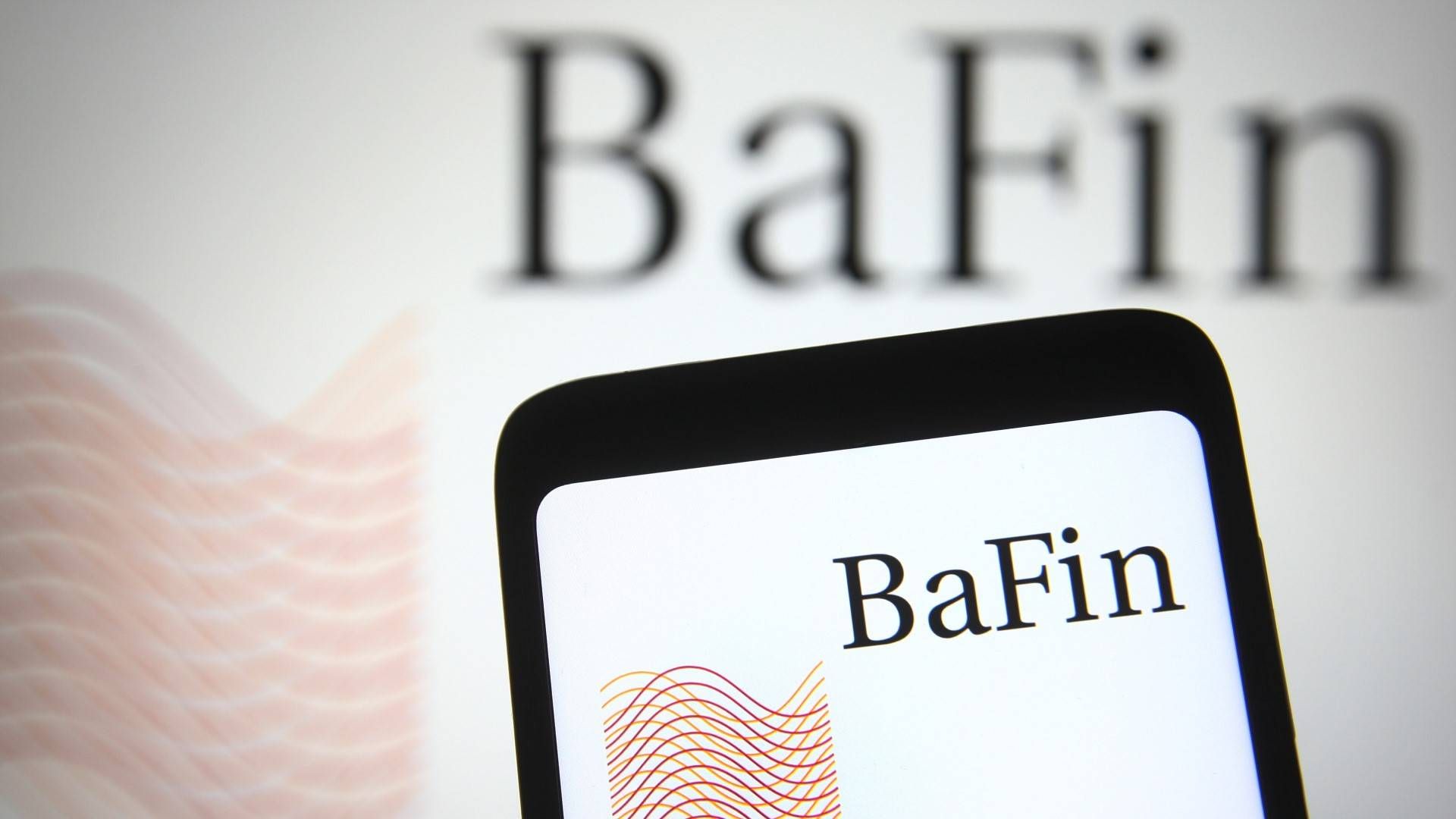 Logo der BaFin auf einem Smartphone-Display. | Foto: picture alliance / ZUMAPRESS.com | Pavlo Gonchar