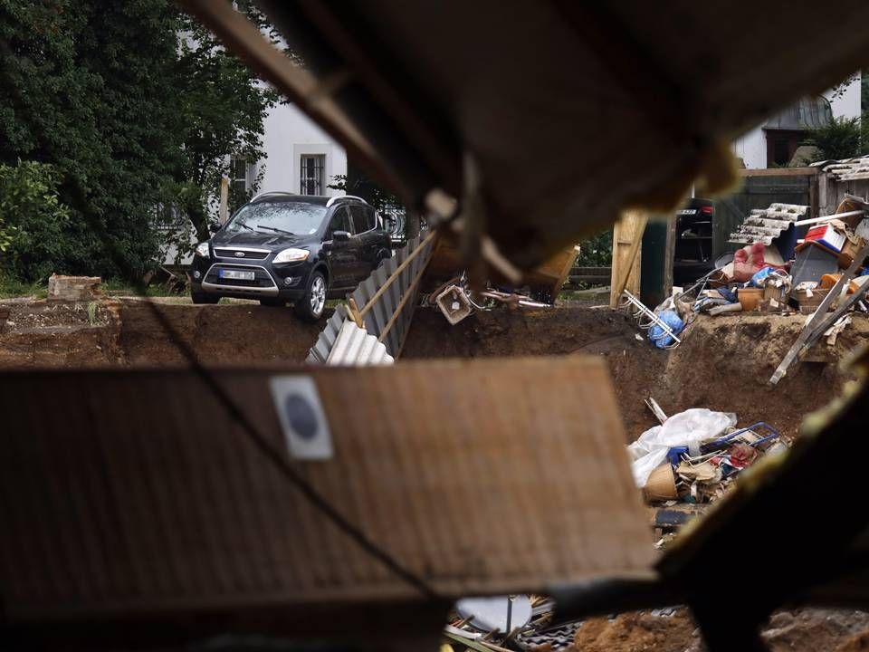 Ein nach Unterspülung eingestürztes Haus in Erftstadt-Blessem. | Foto: picture alliance / Geisler-Fotopress | Christoph Hardt