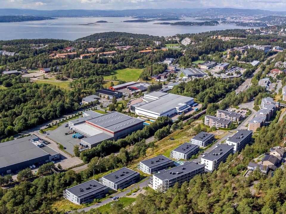 FRA INDUSTRI TIL BOLIG: Det gamle industriområdet på Rosenholm skal bli en ny OBOS-bydel med nærmere 2000 bolige | Foto: Nyebilder.no