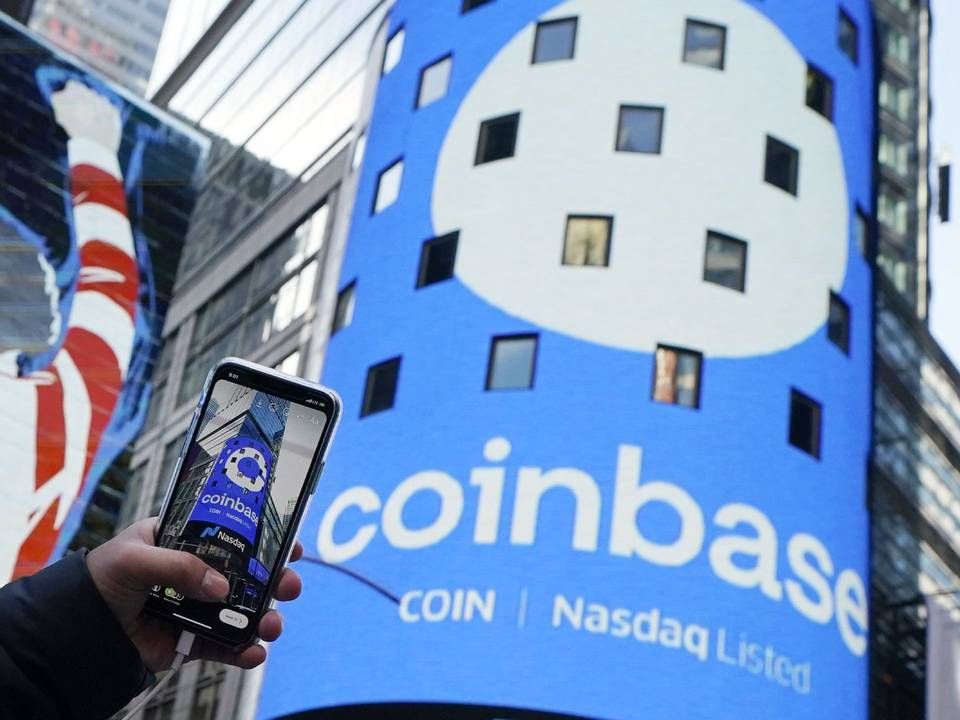 Coinbase trekker i bremsen for sitt planlagte innskuddsprogram med rente for kryptovaluta. | Foto: NTB/AP Photo/Richard Drew