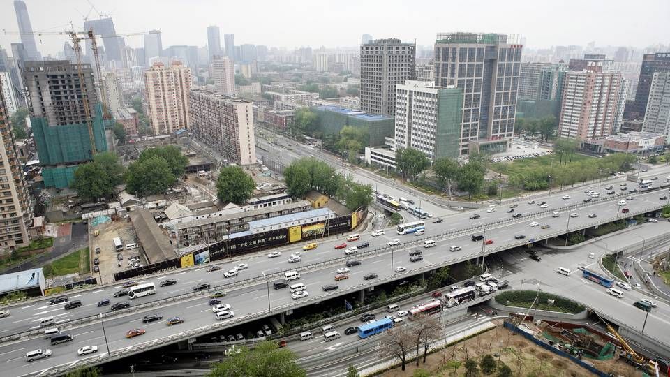 Kinas hovedstad, Beijing, hvor der i gennemsnit kommer 1000 nye biler på gaden om dagen. Kinas regering har udsendt handlingsplan, som viser, at landets CO2-udledning skal begynde at falde inden 2030. | Foto: Thomas Borberg
