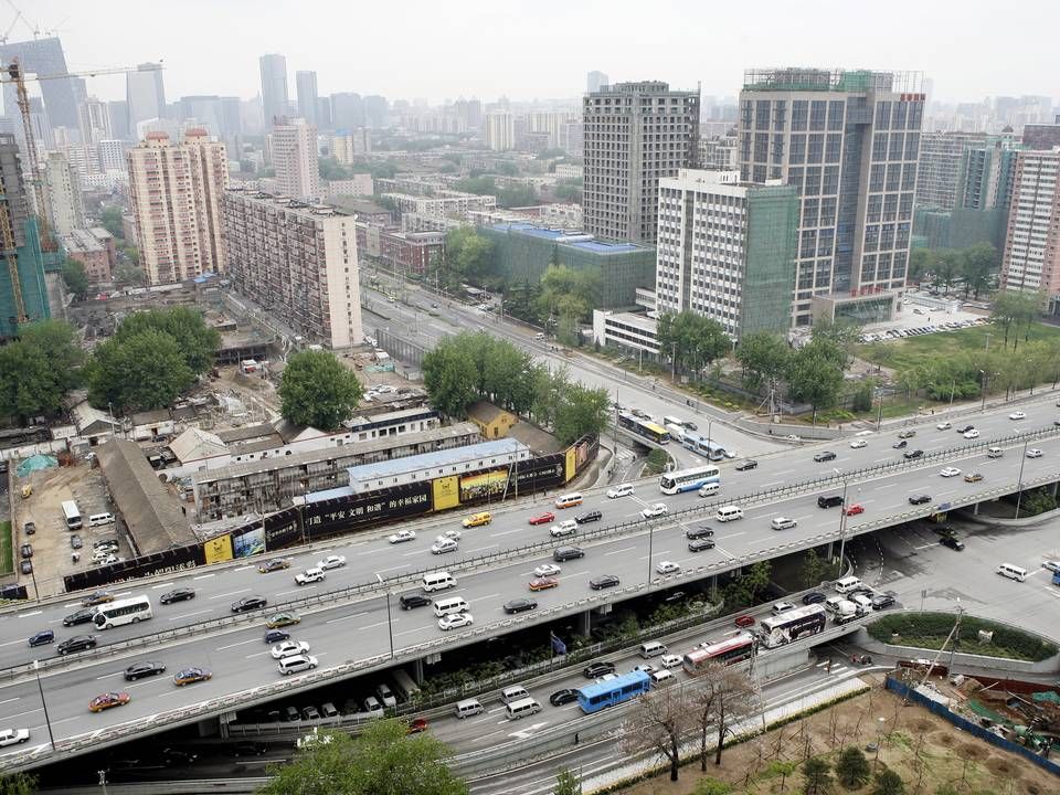 Kinas hovedstad, Beijing, hvor der i gennemsnit kommer 1000 nye biler på gaden om dagen. Kinas regering har udsendt handlingsplan, som viser, at landets CO2-udledning skal begynde at falde inden 2030. | Foto: Thomas Borberg