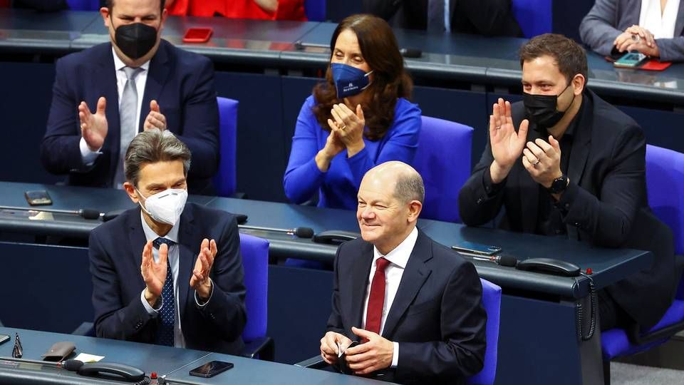 Olaf Scholz (uden mundbind) er netop valgt som tysk forbundskansler. | Foto: Fabrizio Bensch/Reuters/Ritzau Scanpix