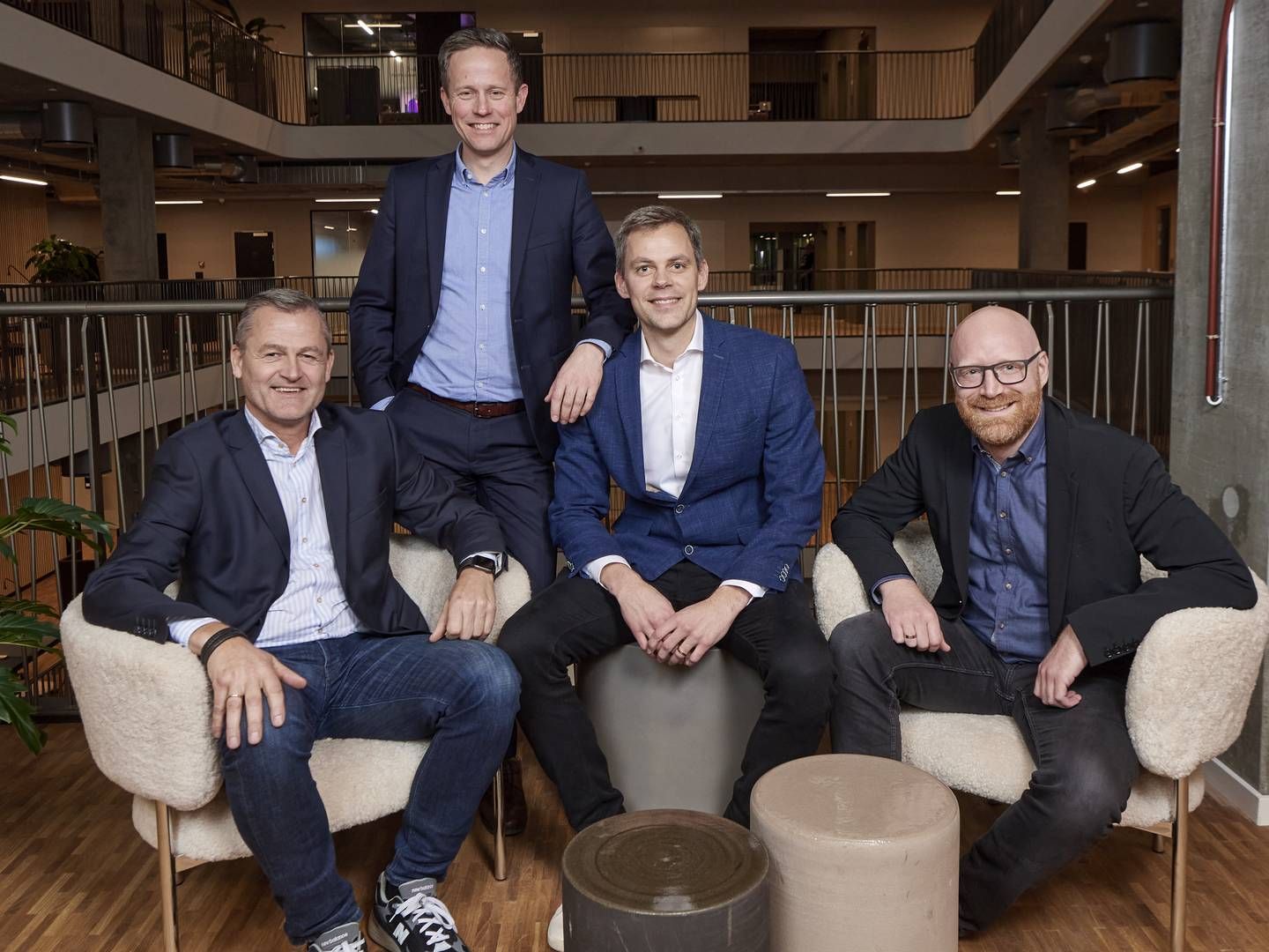 Fra venstre: Christian Søsted Poulsen (CEO i Co3), Lars Berthelsen (CEO i Visma Consulting og direktør for Visma Custom Solutions i Danmark), Anders Ebdrup (CEO Smartpage) og Mikkel Ulstrup (Partner og Head of Business Development Smartpage). | Foto: PR