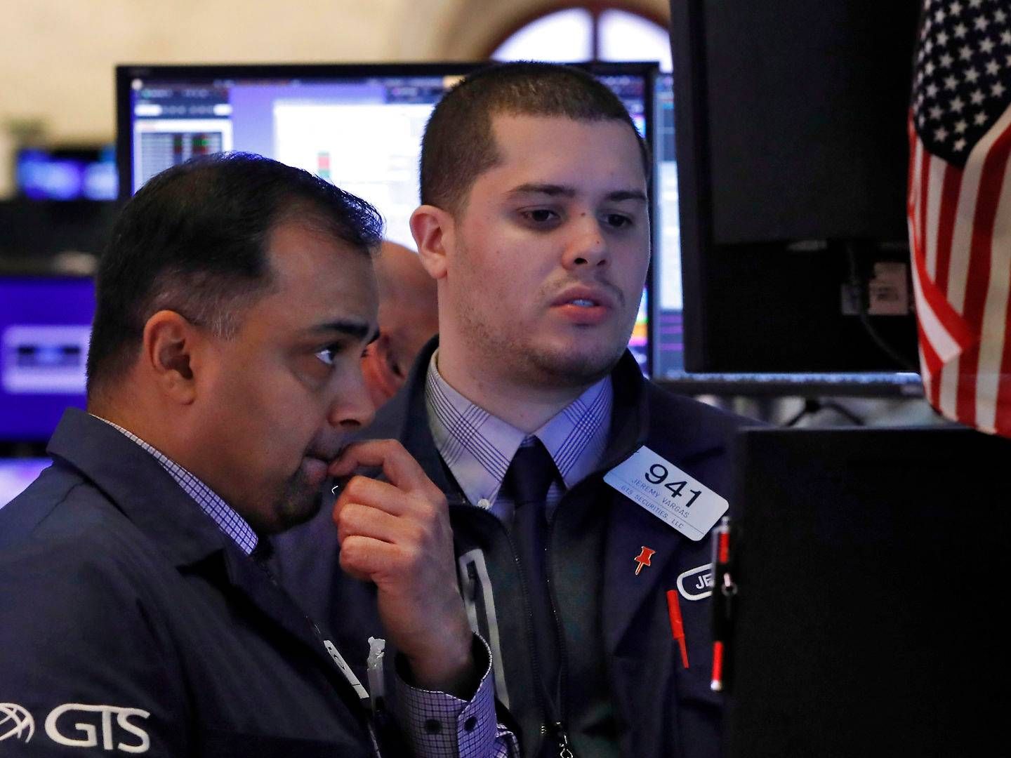 Specialists Dilip Patel, left, and Jeremy Vargas work on the floor of the New York Stock Exchange, Thursday, March 12, 2020. | Photo: Richard Drew/AP/Ritzau Scanpix