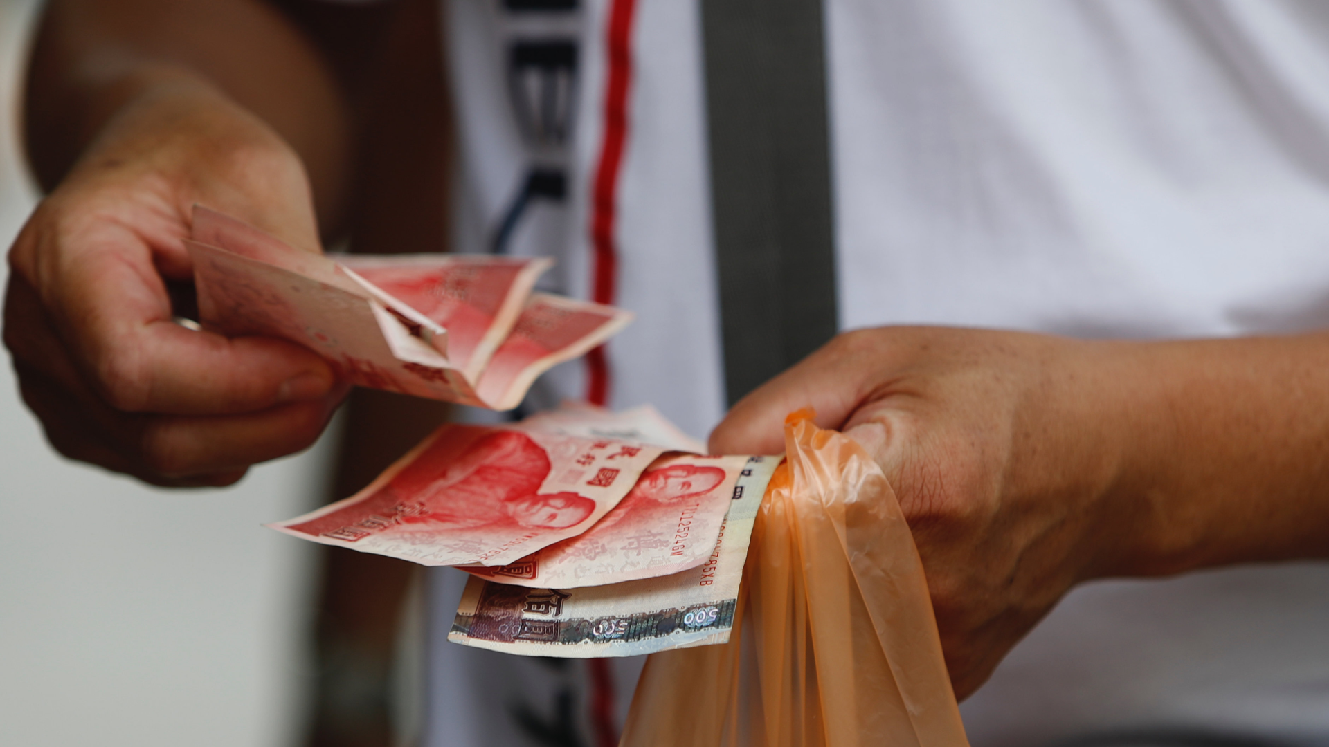 Bezahlen mit dem Taiwan-Dollar | Foto: picture alliance / NurPhoto | Ceng Shou Yi