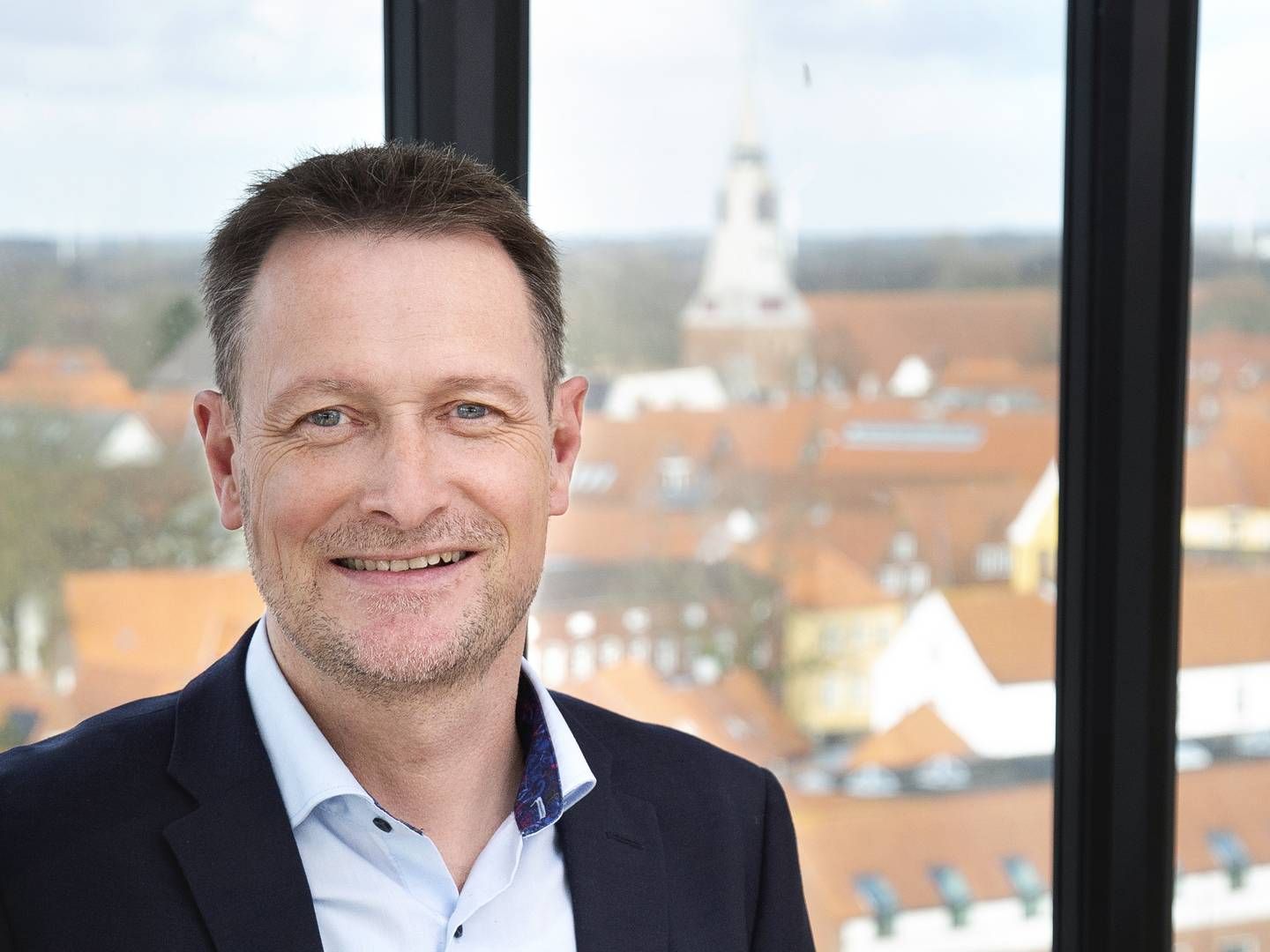 Direktør i Sparekassen Bredebro, Keld Riddersholm Nielsen, også resten af ledelsen i sparekassen, er tilfreds med resultatet for 2021. | Foto: PR