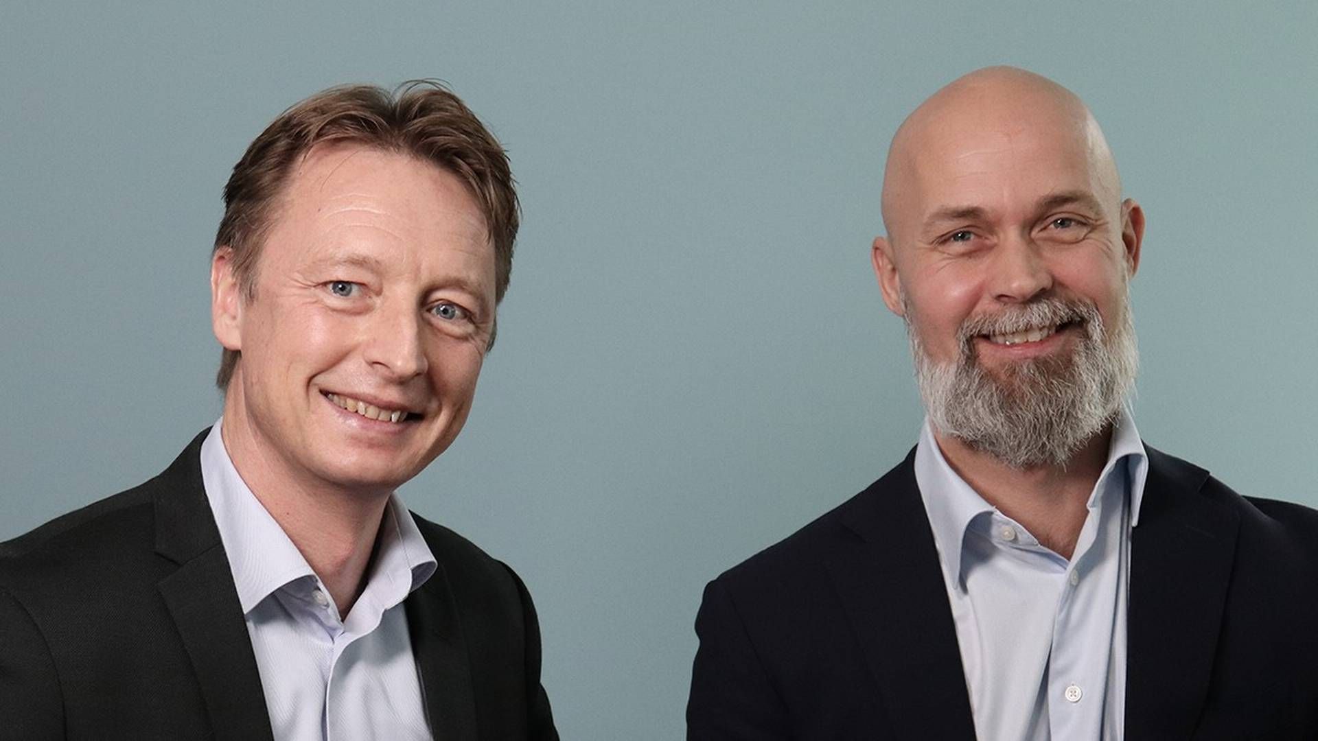 Teknologidirektør i SDC, Jesper Nyvold Larsen og områdedirektør for salg, kundekontakt og fellestjenester i SDC, Stig Valderhaug. | Foto: SDC / PR