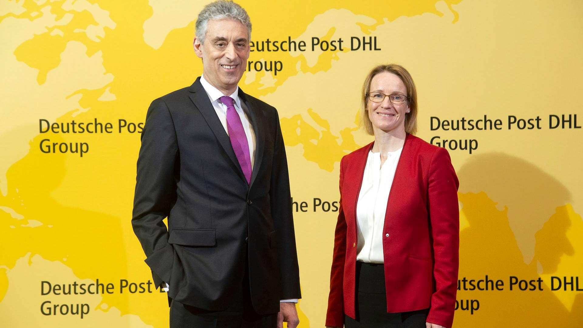 Topchef i Deutsche Post DHL, Frank Appel (tv) og finansdirektør Melanie Kreis (th) | Foto: Malte Ossowski/AP/Ritzau Scanpix