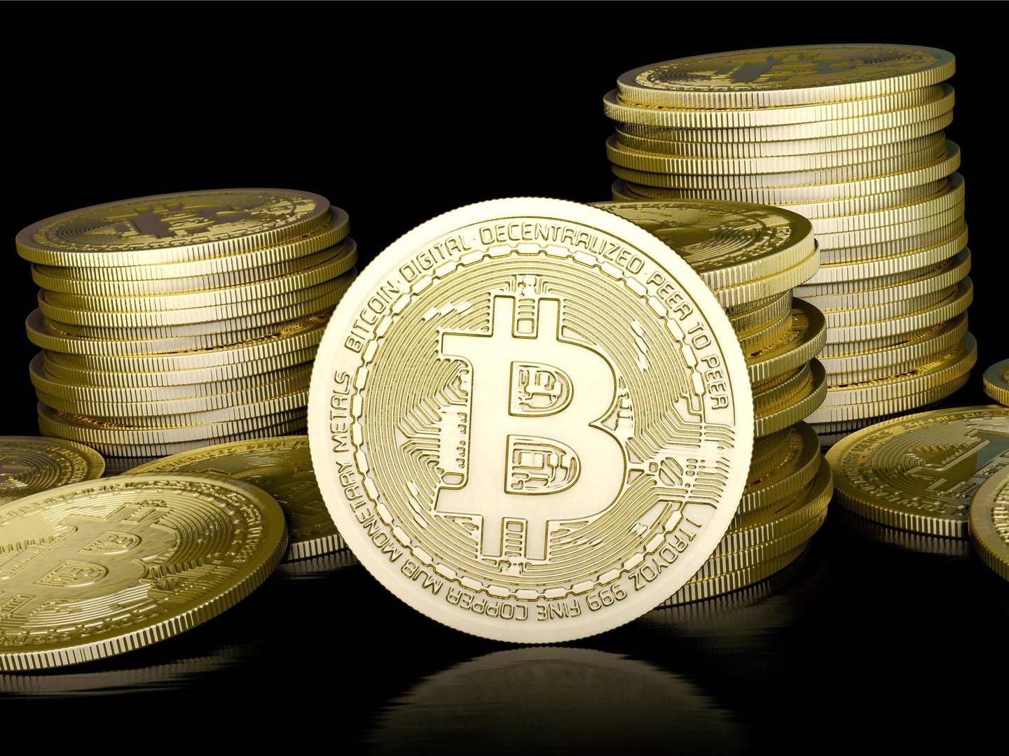 Eine symbolische "Bitcoin-Münze". | Foto: picture alliance / Zoonar | DesignIt