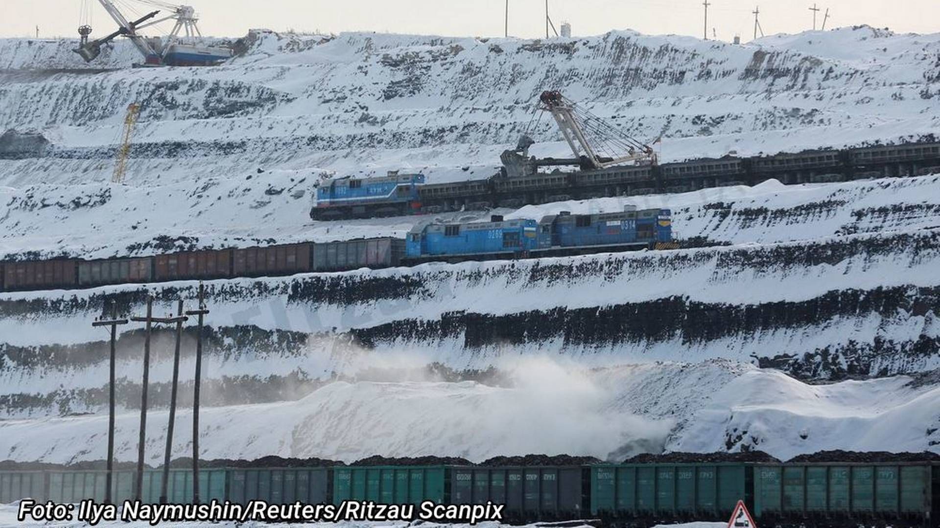 Trains are loaded with coal at Russia's largest Borodinsky opencast colliery, owned by the Siberian Coal Energy Company, near the Siberian town of Borodino, Krasnoyarsk region, Russia. | Photo: Ilya Naymushin/Reuters/Ritzau Scanpix