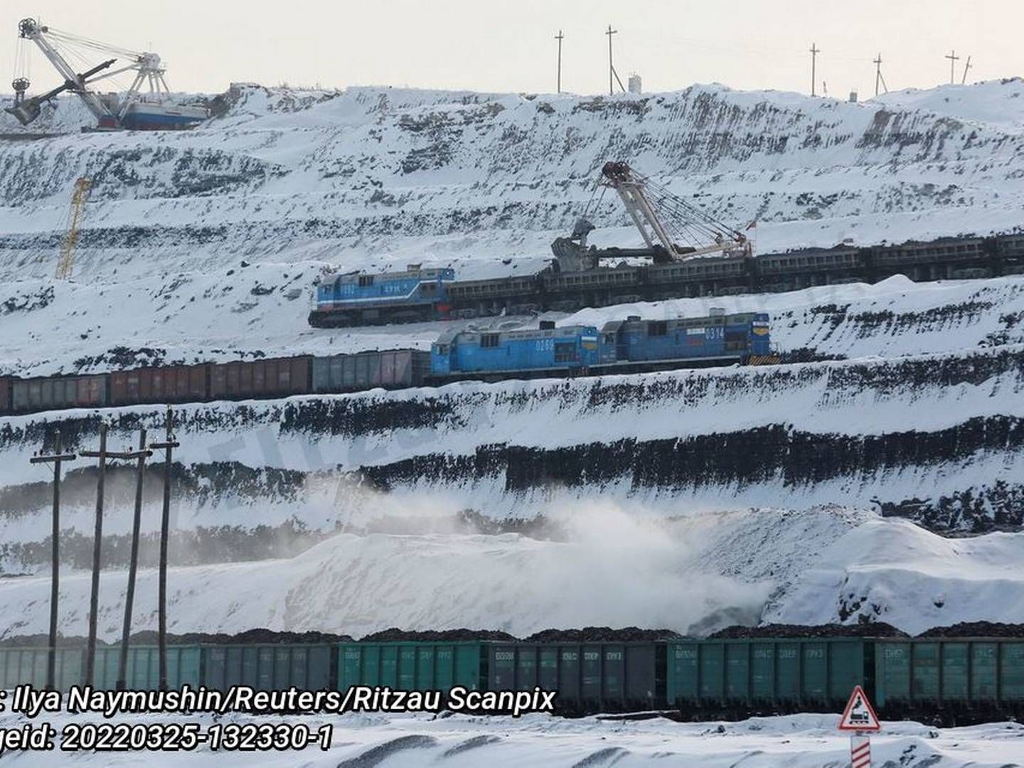 Trains are loaded with coal at Russia's largest Borodinsky opencast colliery, owned by the Siberian Coal Energy Company, near the Siberian town of Borodino, Krasnoyarsk region, Russia. | Photo: Ilya Naymushin/Reuters/Ritzau Scanpix