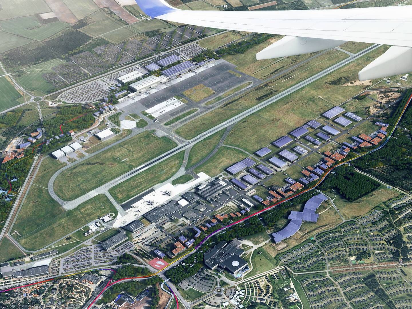 Illustration af fremtidens lufthavn i 2040. Røde og blå bygninger er illustreringer, og ingen bygninger er fastlagt. | Foto: PR-visualisering