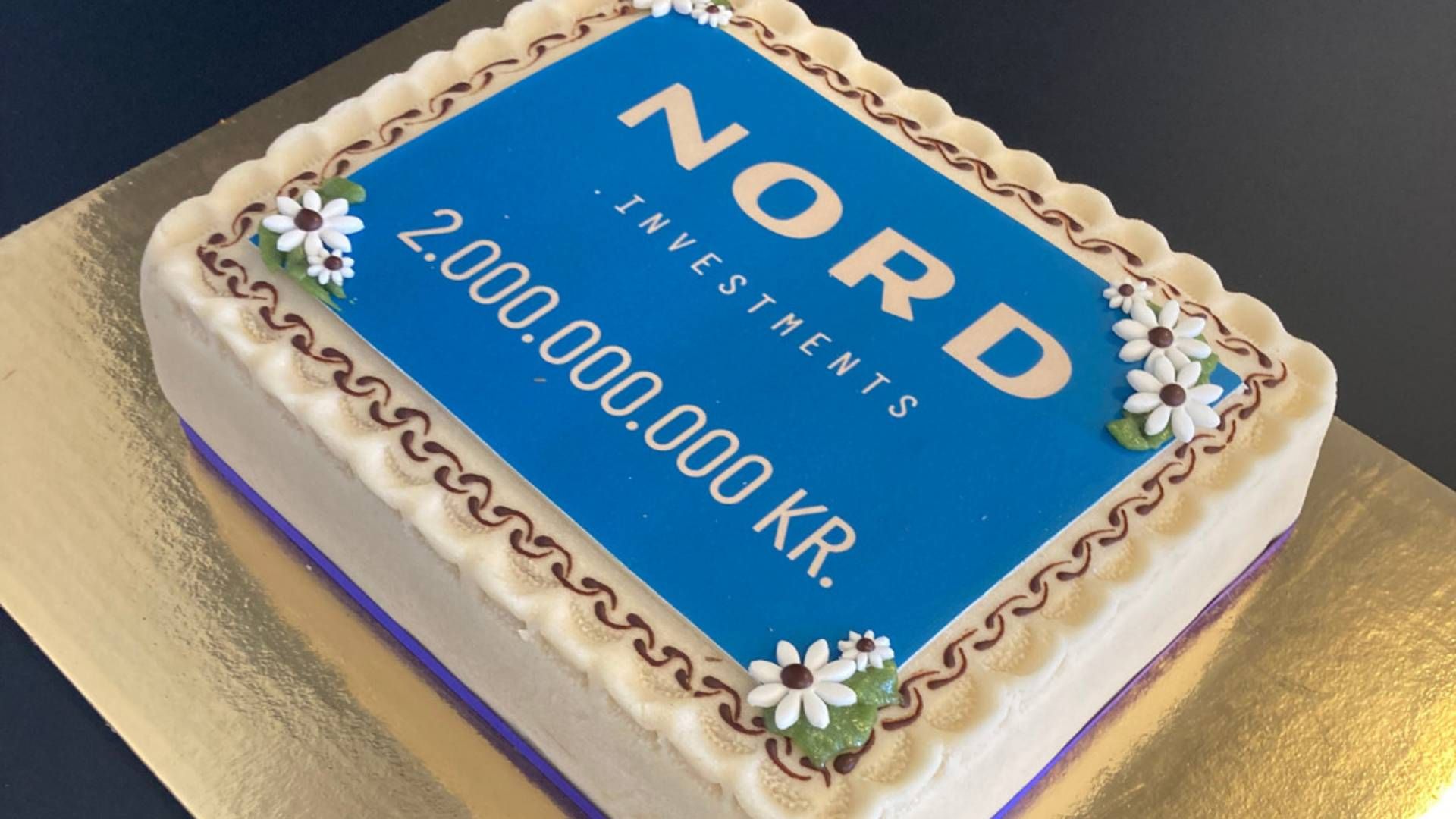 Nord Investments celebrated reaching the DKK 2bn (EUR 270m) milestone with cake. | Photo: Nord.Investments / PR