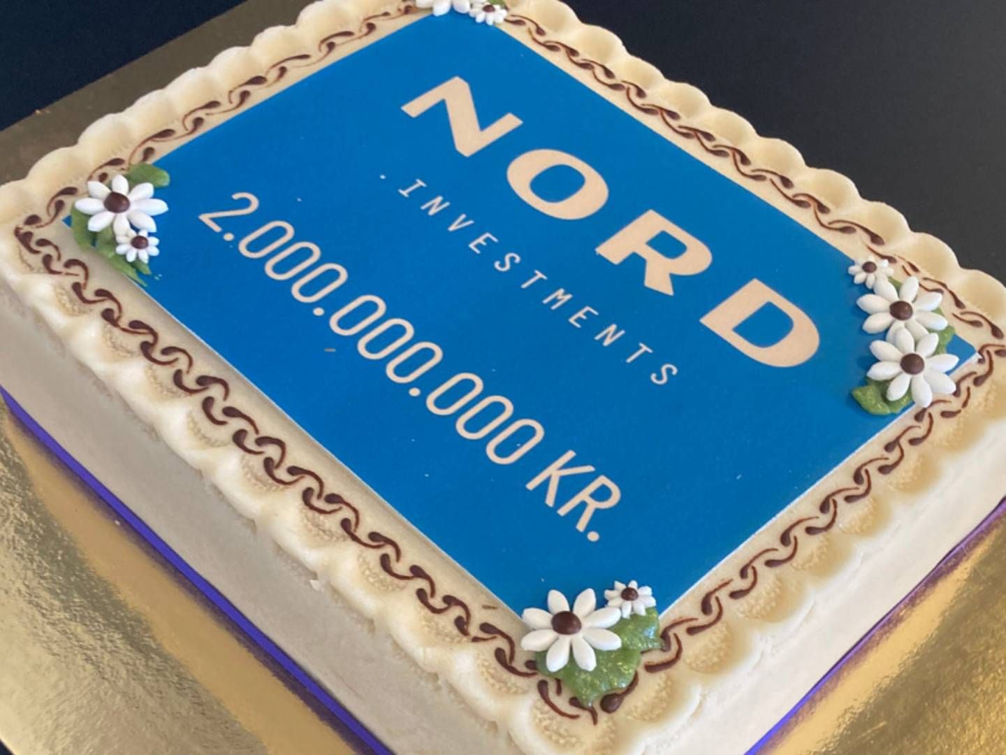 Nord Investments celebrated reaching the DKK 2bn (EUR 270m) milestone with cake. | Photo: Nord.Investments / PR