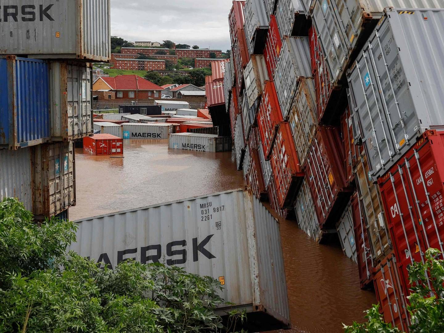 De omfattende oversvømmelser i Durban har ødelagt infrastruktur og hæmmet adgangen til havnen i byen. | Foto: Phill Magakoe/AFP/Ritzau Scanpix