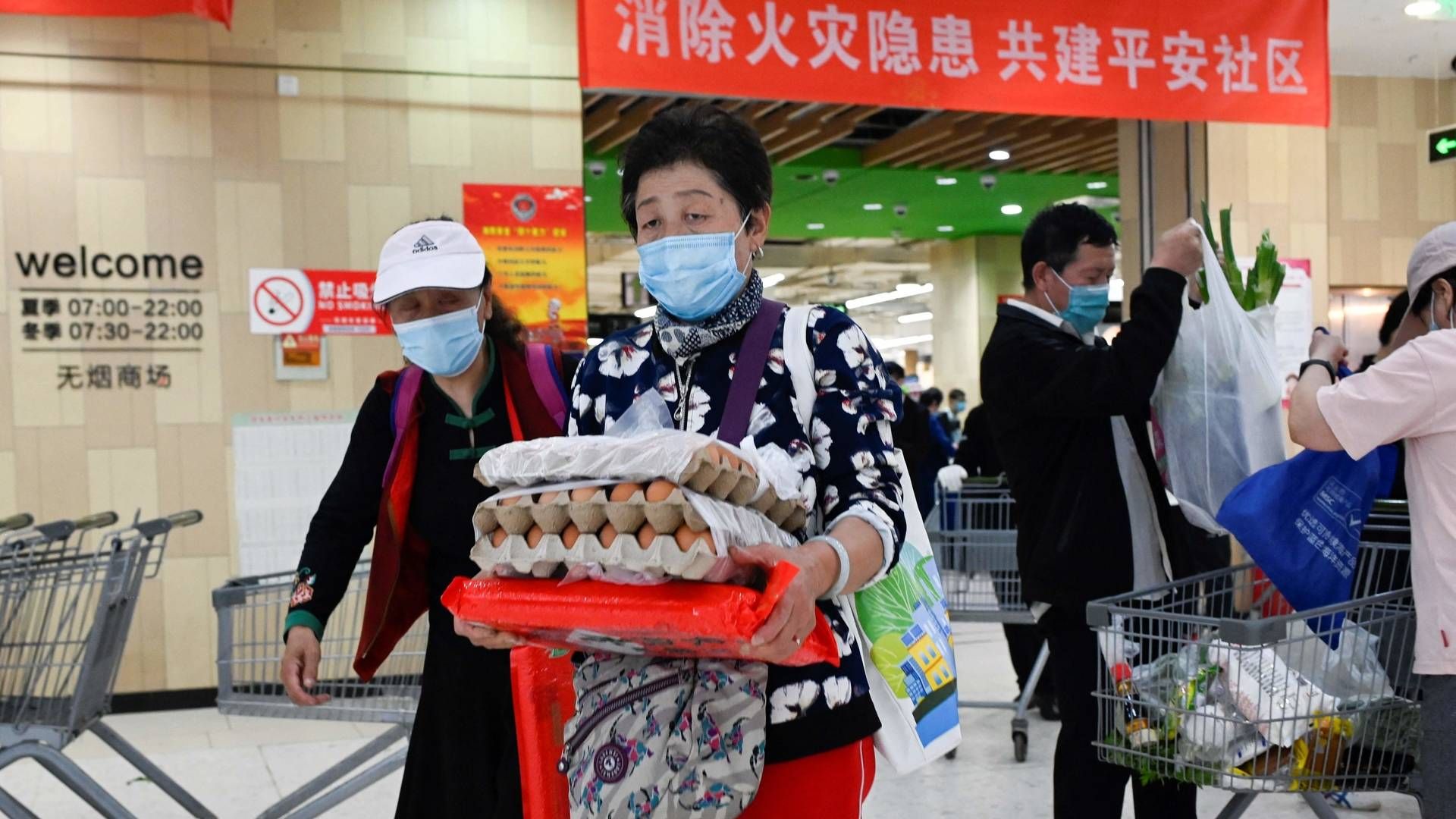 Både fysiske og online butikker er overrendt af handlende, efter Beijings største distrikt er begyndt at teste alle borgere for coronavirus. | Foto: Wang Zhao/AFP / AFP