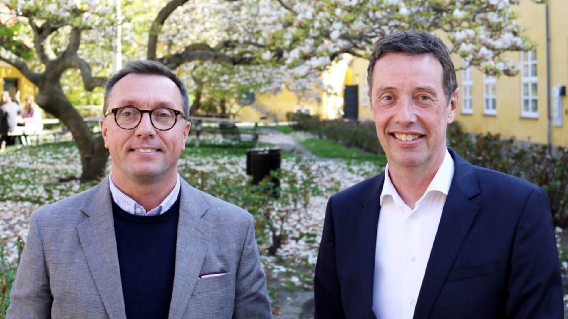 Adm. direktør for Dansk Mode & Textil Thomas Klausen (tv) har hentet Jens Birkeholm til huse for at opbygge den nye brancheafdeling DM&T Detail | Foto: DM&T