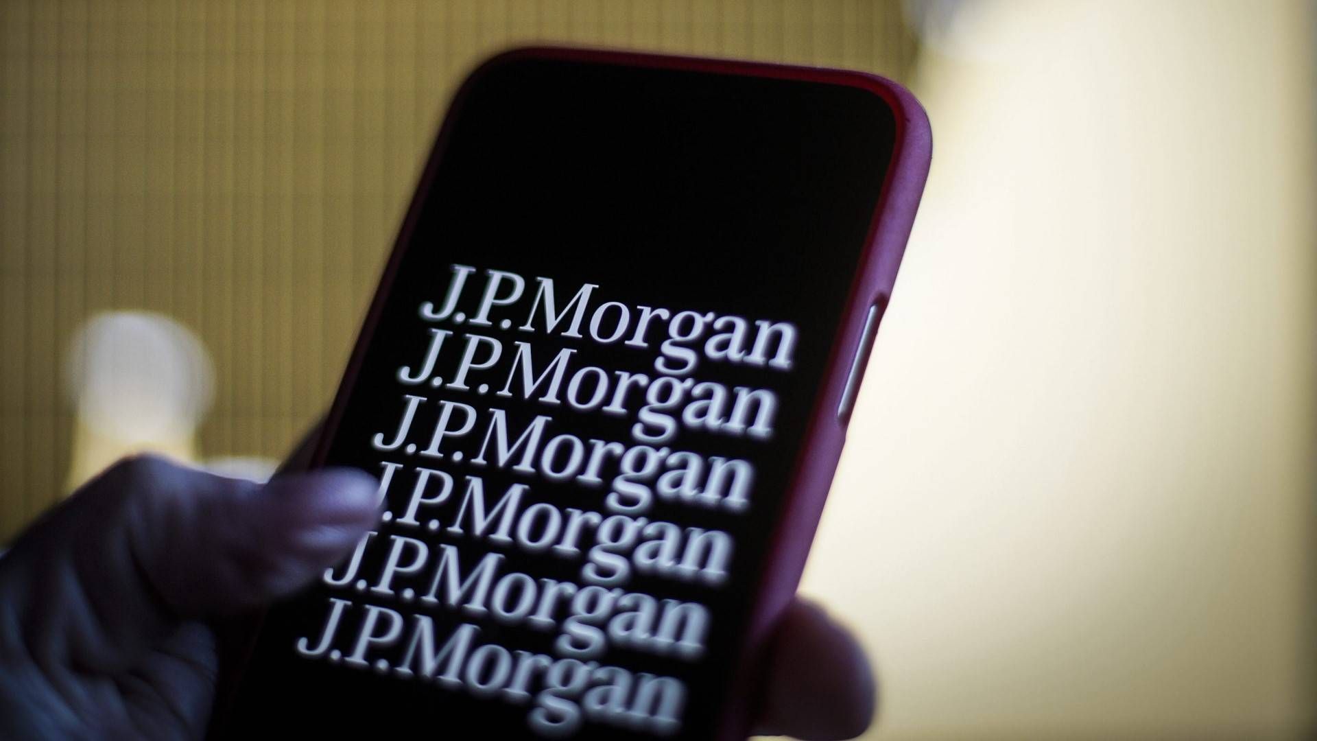 Logo von JP Morgan auf einem Smartphone. | Foto: picture alliance / NurPhoto | Jaap Arriens