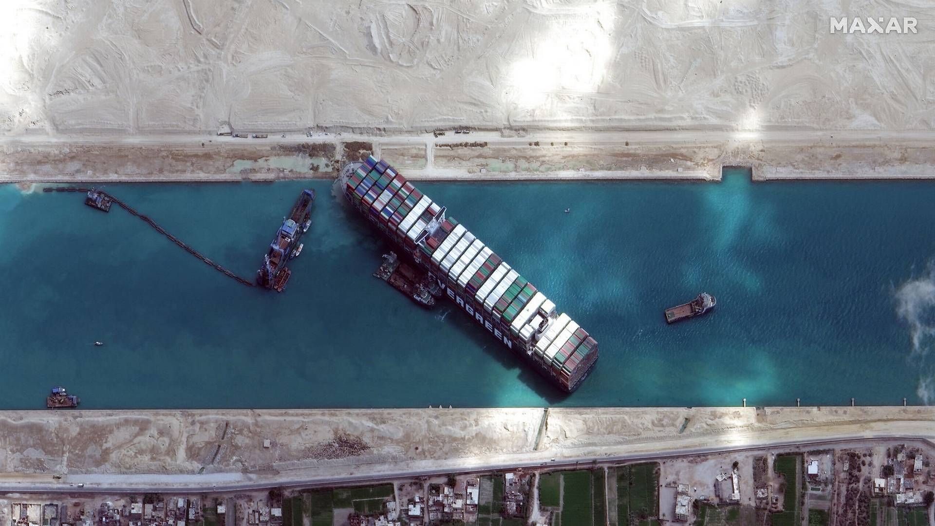 Containerskibet Ever Given spærrede Suez-Kanalen i seks døgn - og skabte store problemer for verdenshandelen. | Foto: Maxar Technologies/Reuters/Ritzau Scanpix