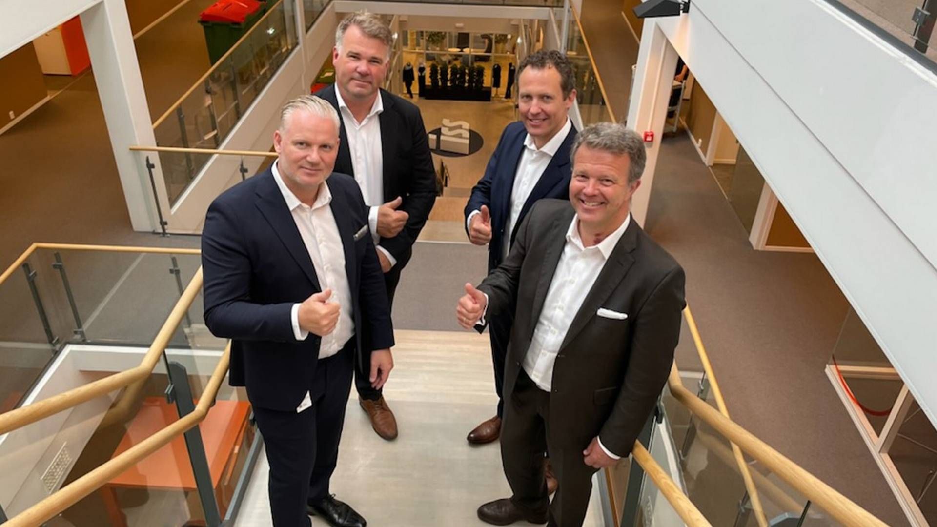 FORLENGER MED OBOS: ISS Facility Services utvider sitt hovedkontor i Kværnerhallen. Fra venstre Carl-Fredrik Bjor, CEO i ISS Norge og ISS Nord Europa, Alexander Gaden, Business Development Director & Head of Technical Services i ISS, eiendomssjef Øystein Embretsen og forvaltningssjef Thor Bareksten i OBOS Eiendom. | Foto: Obos Eiendom