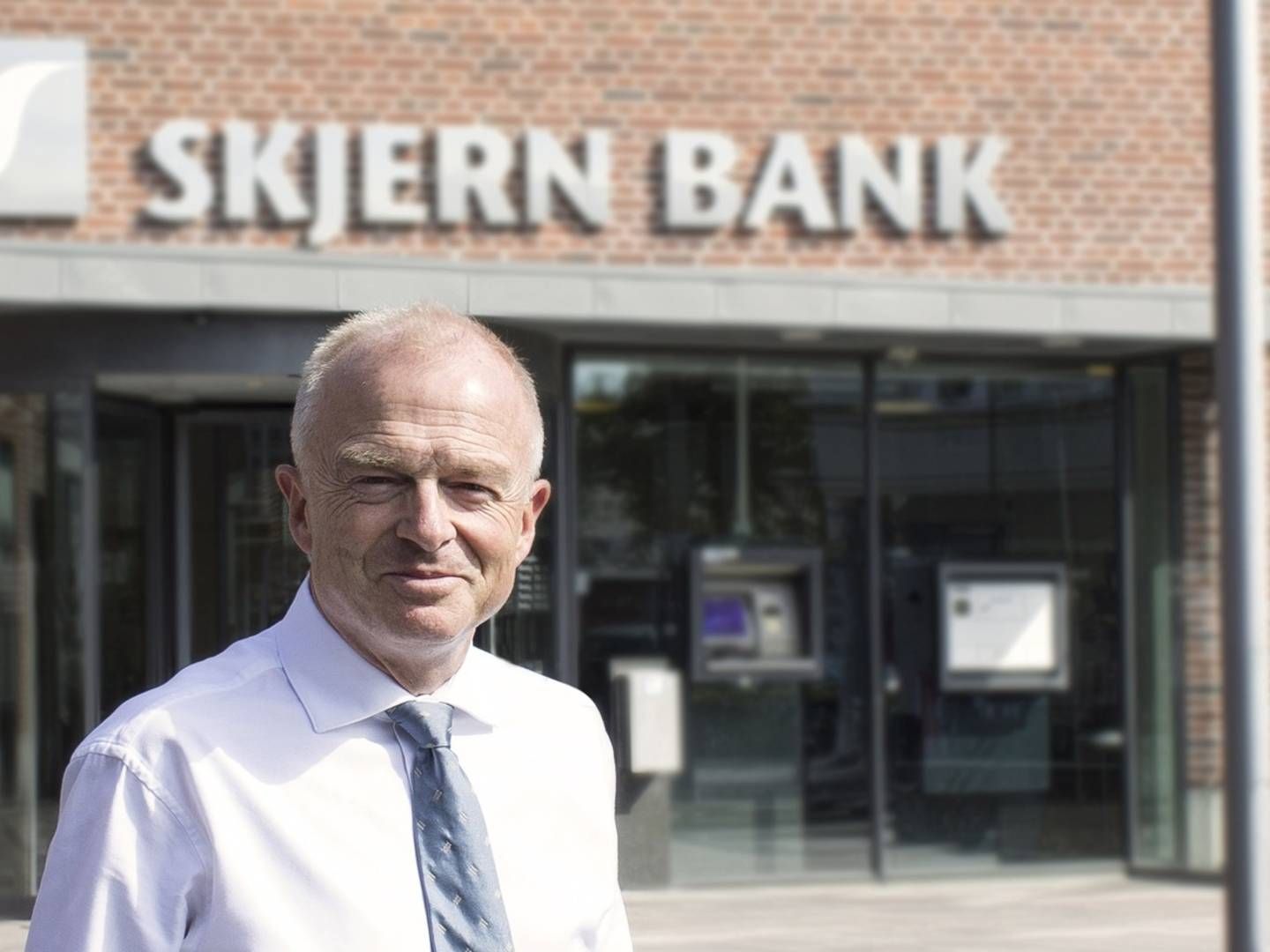 Per Munck er tilfreds med årets første seks måneder trods stor kursregulering. | Foto: PR/Skjern Bank
