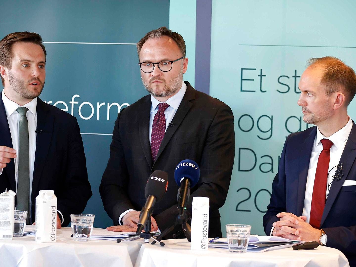 Danish Minister of Business Affairs Simon Kollerup (S) and Danish Minister of Climate, Energy and Utilities Dan Jørgensen (S) are here seen with Danish Minister of Taxation Jeppe Bruus (S) at a press meeting previously in the year. | Photo: Jens Dresling/Ritzau Scanpix