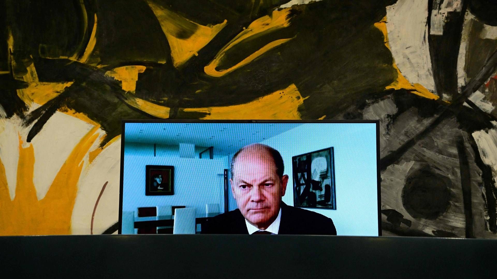 Den tyske kansler, Olaf Scholz, var med til pressemøde om energipakken via video på grund af en covid-infektion. | Foto: JOHN MACDOUGALL/AFP / AFP