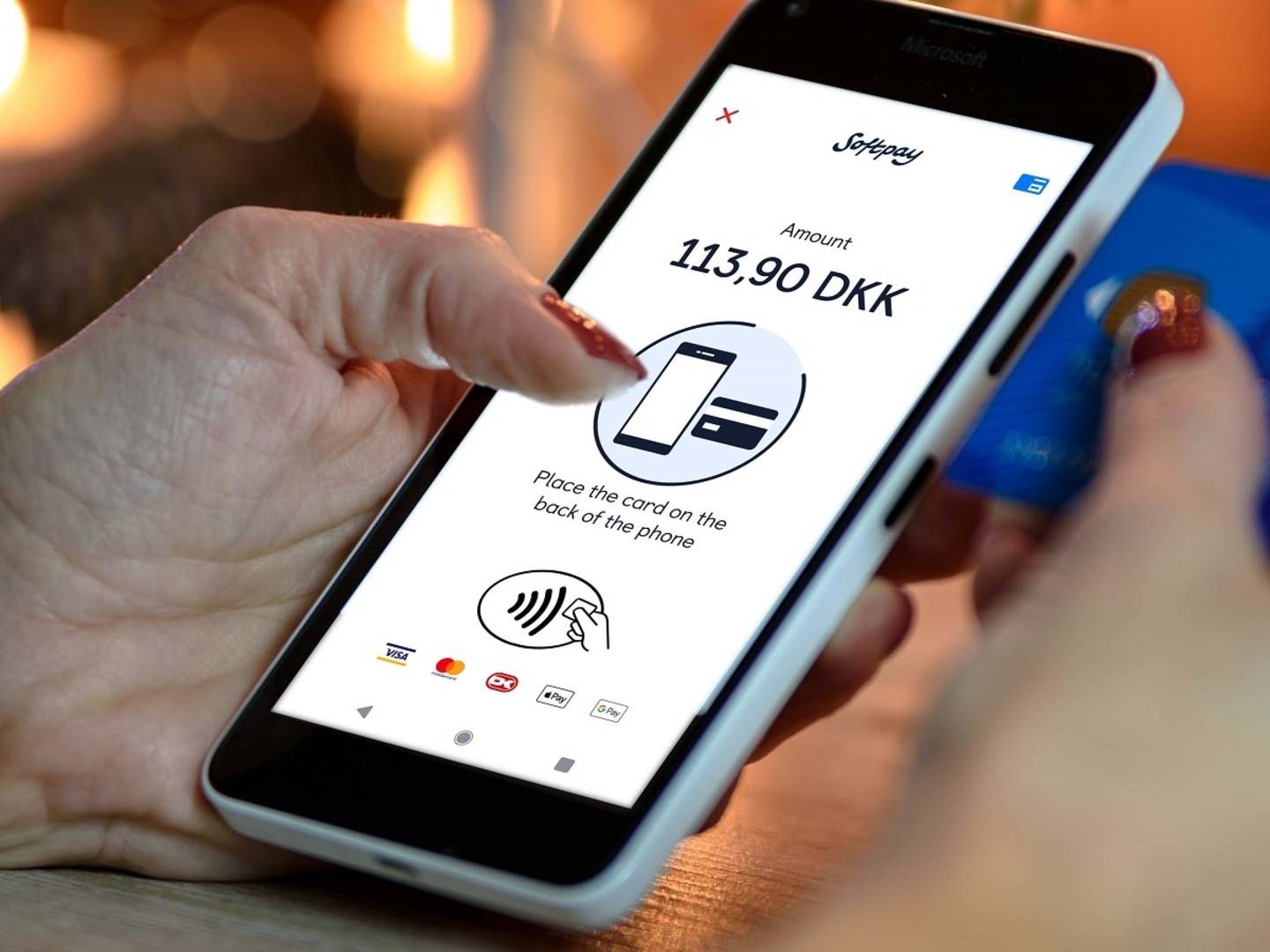 Softpay har udviklet en løsning, hvor virksomheder kan tage imod betaling fra kunder via en Android-telefon. | Foto: PR