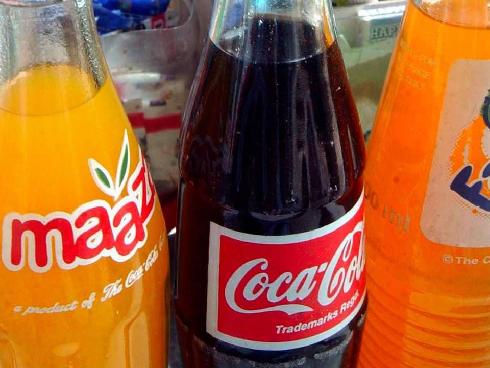 Coca-Cola har store forventninger til mangodrikken Maaza (tv.) på det indiske marked. | Foto: Aman Sharma/AP/POLFOTO/arkiv