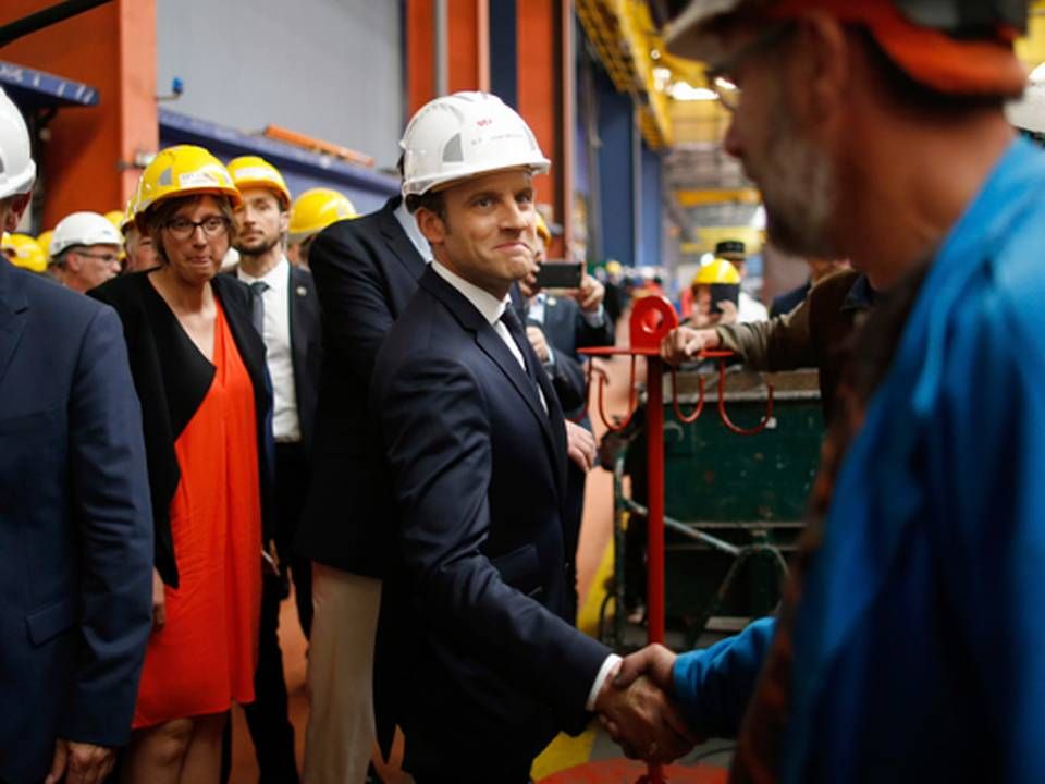 Frankrigs nyvalgte præsident, Emmanuel Macron, besøgte onsdag skibsværftet STX, som er i færd med at blive solgt til italienske Ficantieri. | Foto: /ritzau/AP/Stephane Mahe
