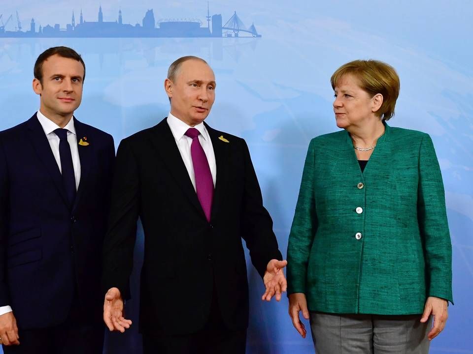 Emmanuel Macron, Vladimir Putin og Angela Merkel. | Foto: /Ritzau/AP/Tobias Schwarz