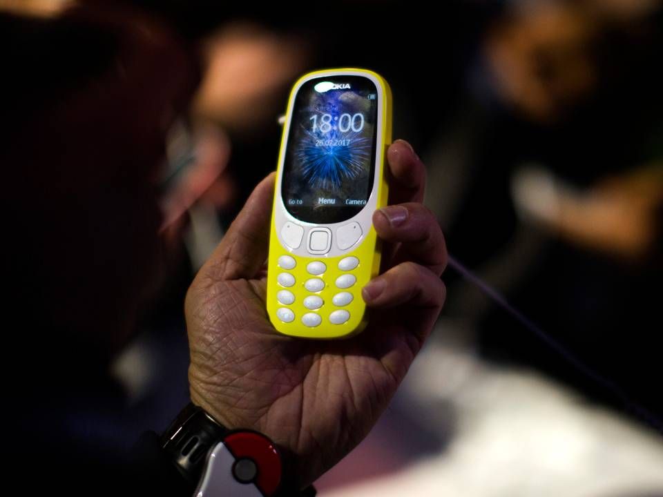 Den originale Nokia 3310 blev udfaset i 2005, men en opdateret udgave blev præsenteret på teknologimessen MWC i Barcelona tidligere i år. | Foto: /ritzau/AP/Emilio Morenatti